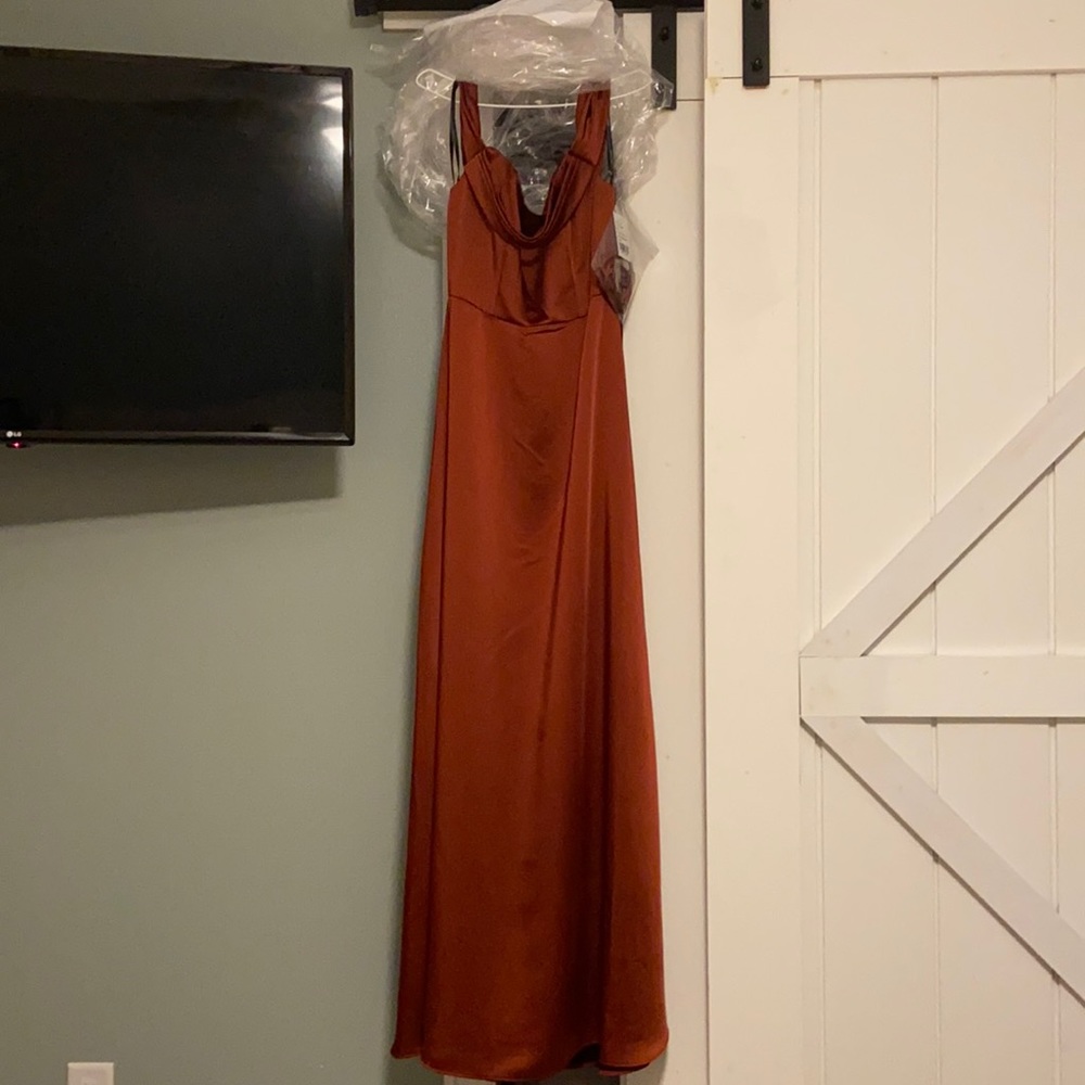 Dessy bridesmaid dress in charmeuse lux. Color is auburn moon